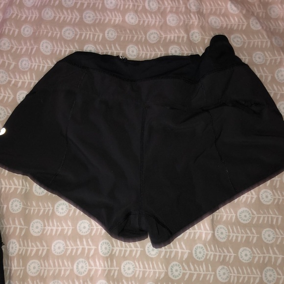 Two pairs of black Lulu Lemon shorts, size medium. - Picture 2 of 9
